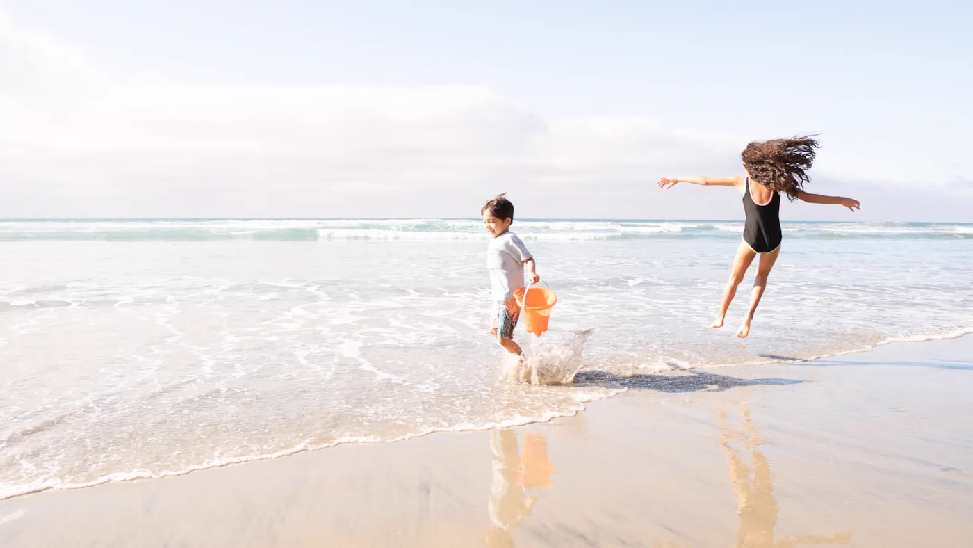 Children playing on the sand
