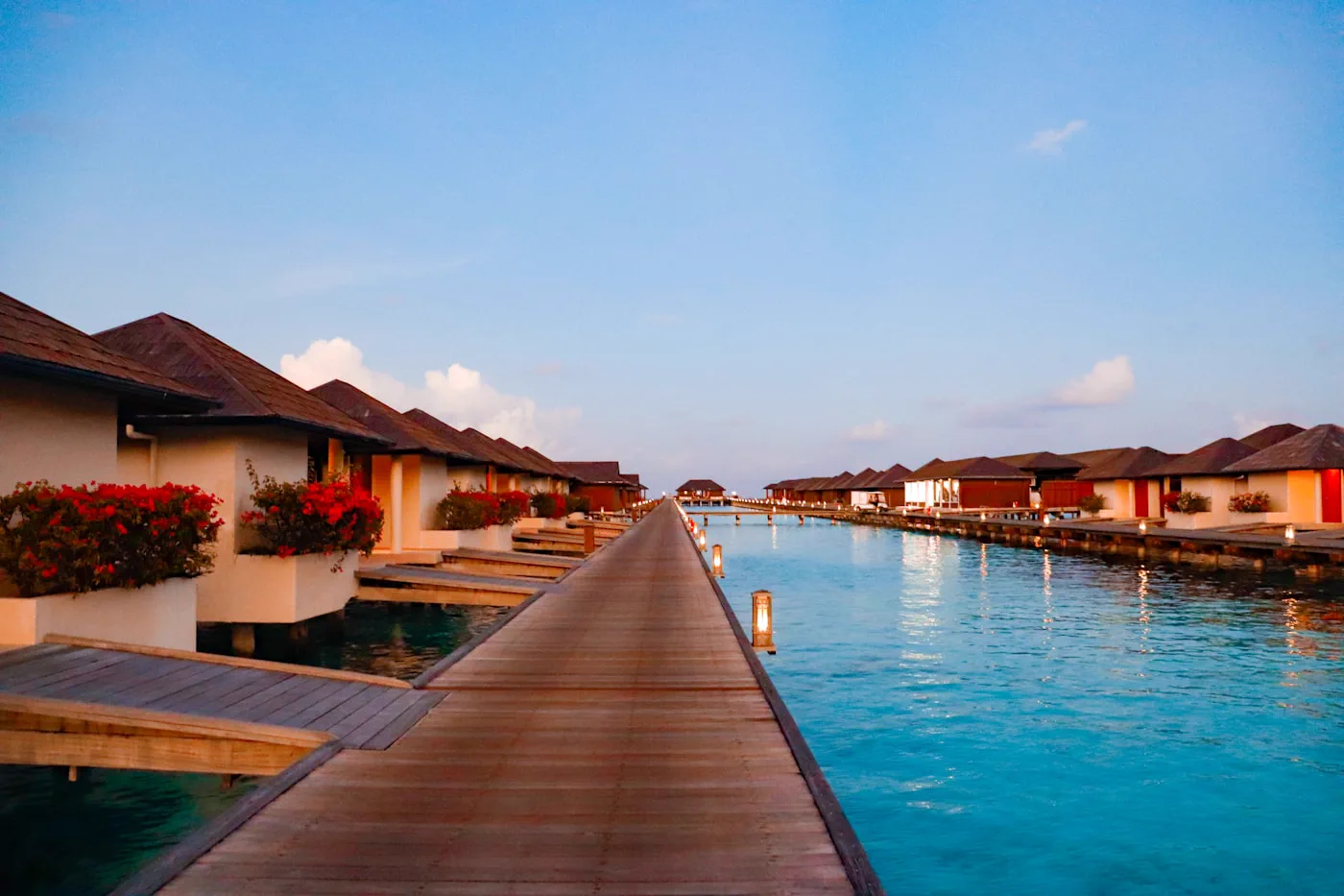 Overwater villas on a turquoise lagoon