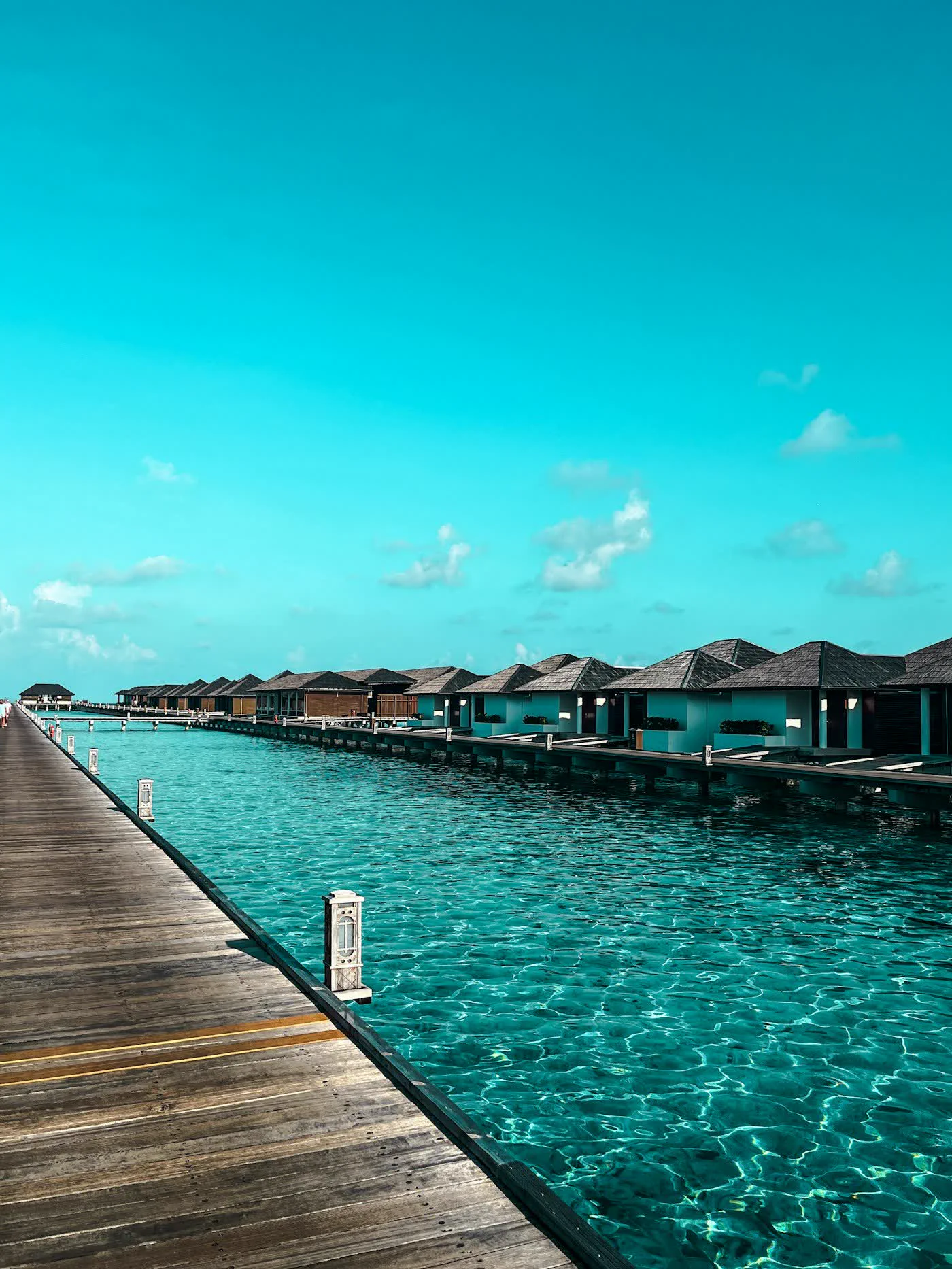 Villas above clear turquoise water