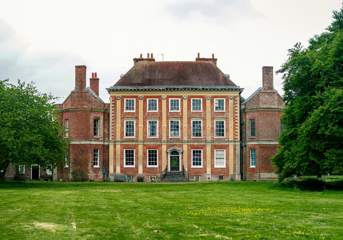 A manor house with green lawns