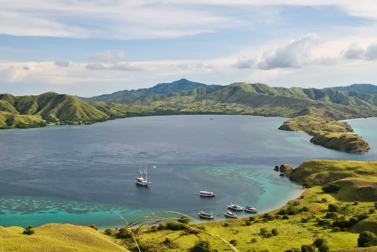 A traditional wooden sailing boat in Indonesia