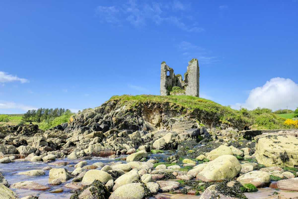 An Irish castle on a green hillside