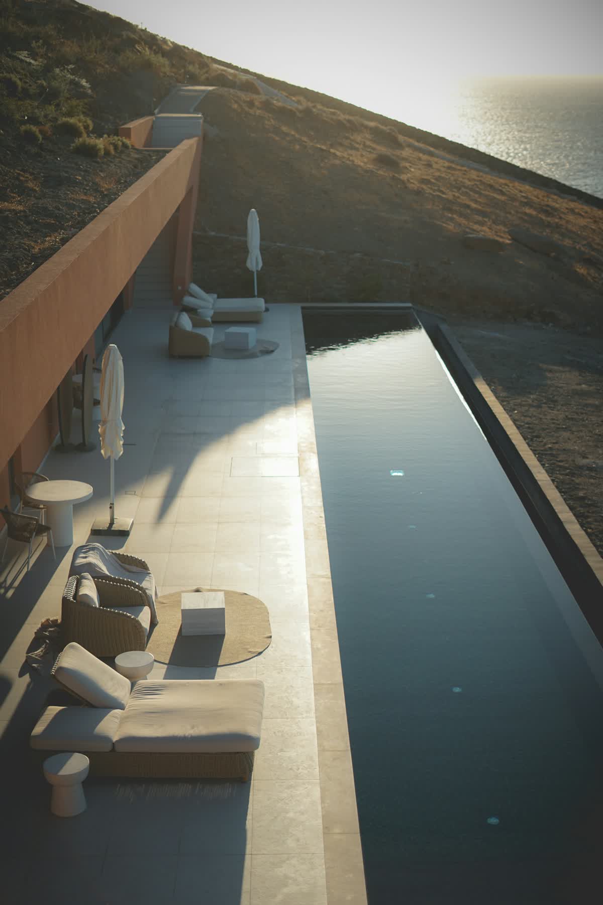 A modern infinity pool with ocean views