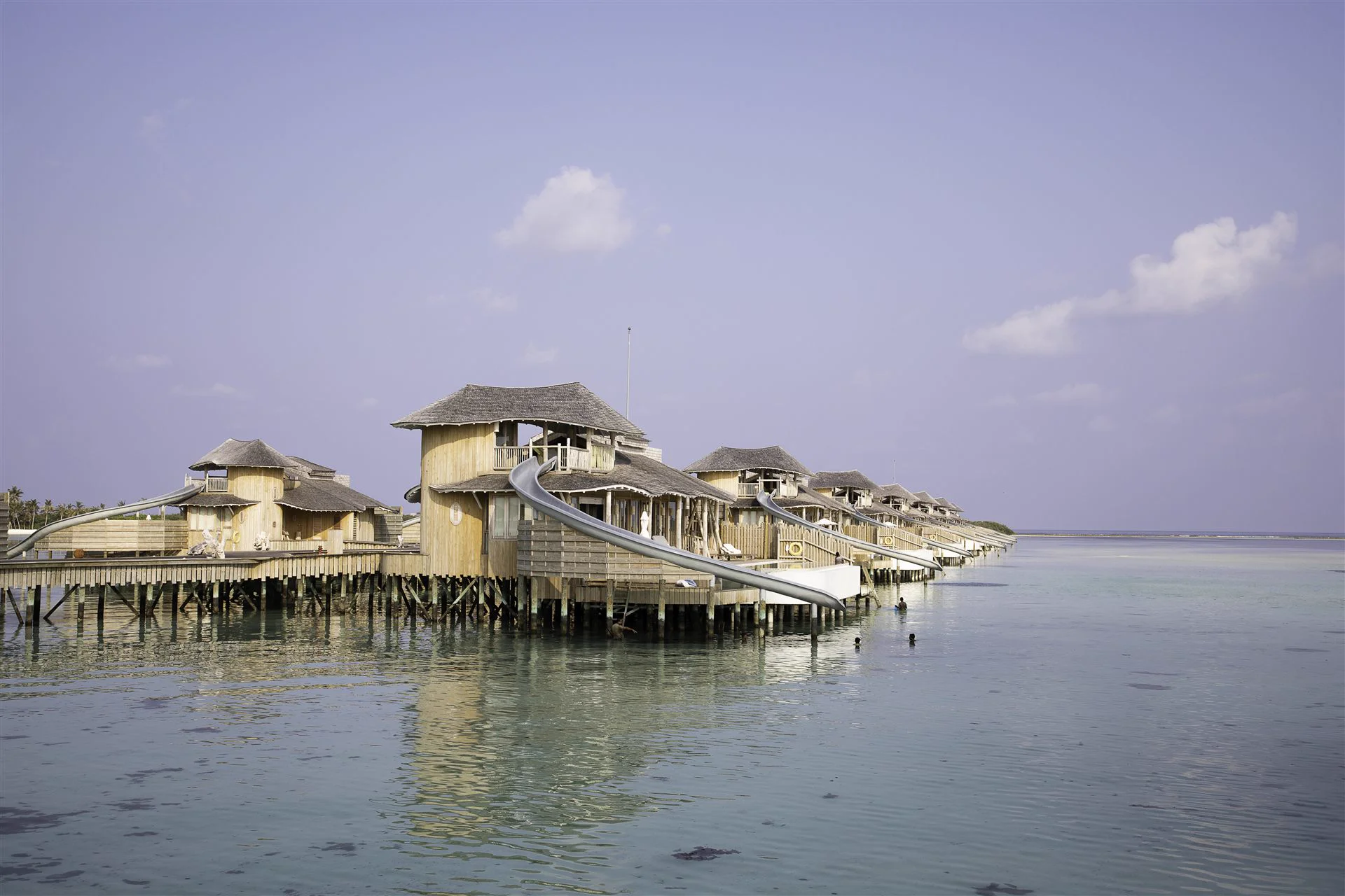 Overwater bungalows in the Maldives — luxury honeymoon travel by StoryTailor